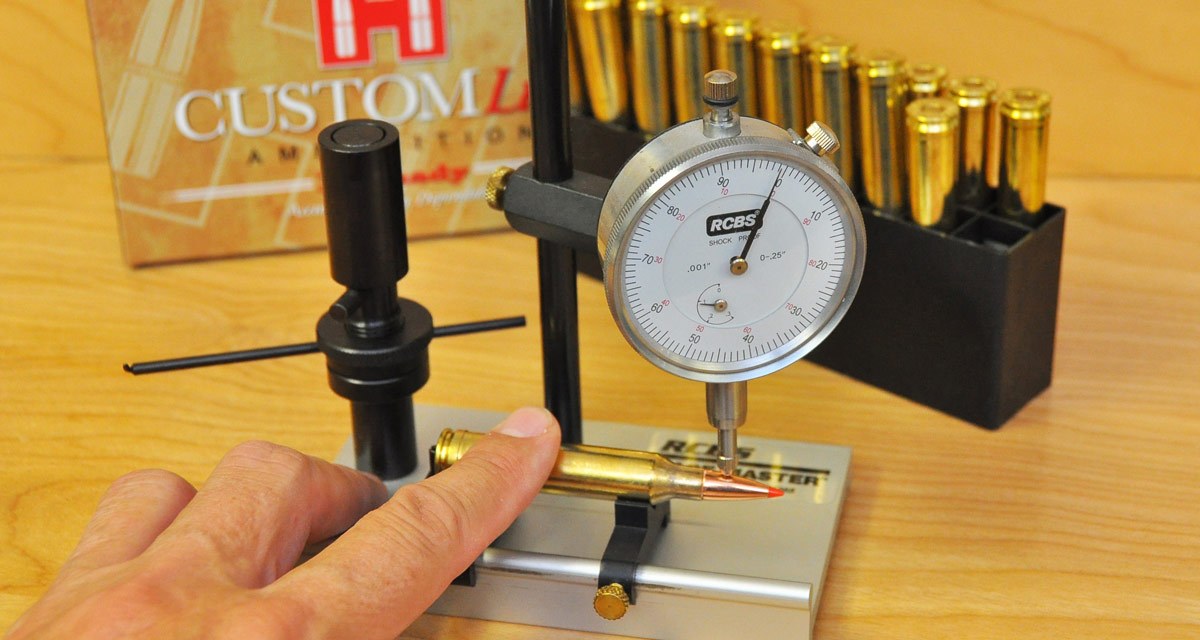 An RCBS Case Master gauge measures bullet runout. This box of Hornady 7mm Remington Magnum all measures under .003" and proved accurate.