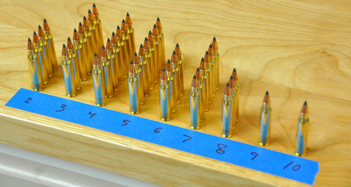 Sorting 40 rounds of factory ammo for bullet runout produced these results, with the numbers on the tape indicating bullet runout in thousandths of an inch. This ammunition isn't particularly accurate, either.
