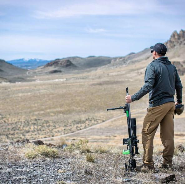 Standing in desert with Custom painted MDT ACC Chassis System