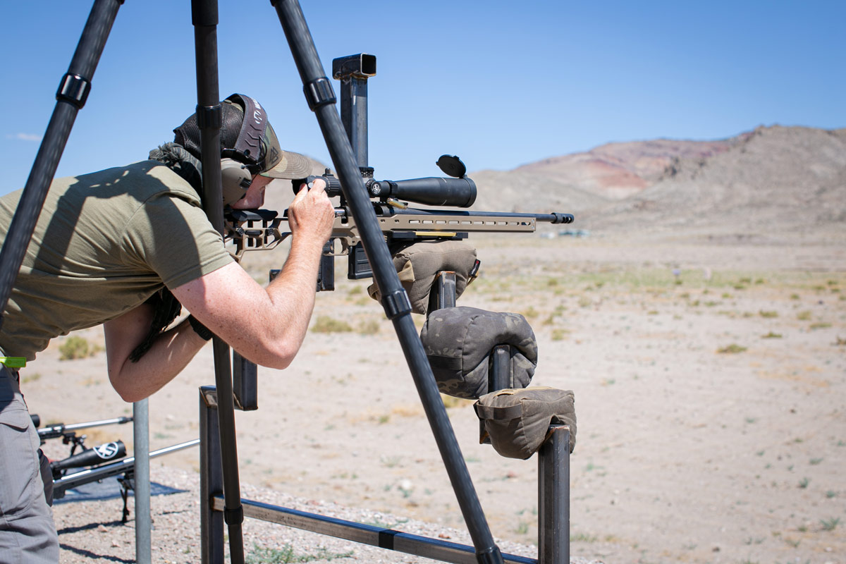 MDT ACC Chassis System shooting off of barricade with tripod rear support
