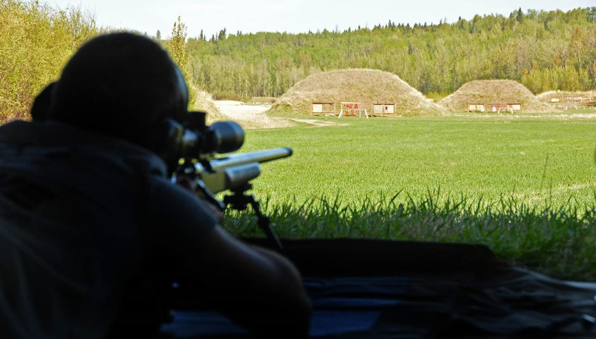 Rifle aiming down range