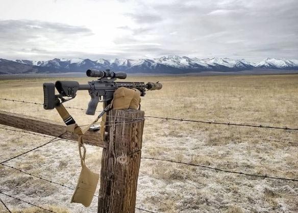 AR mounted on fence post